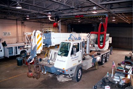 Articulating Crane Arm for Truck Repair Facility 